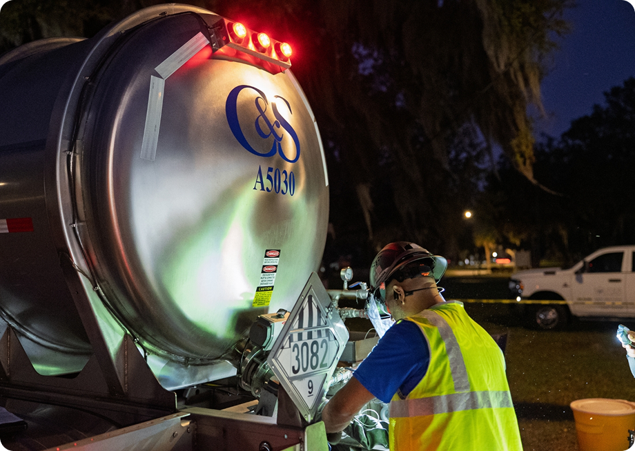 Driver delivering alum